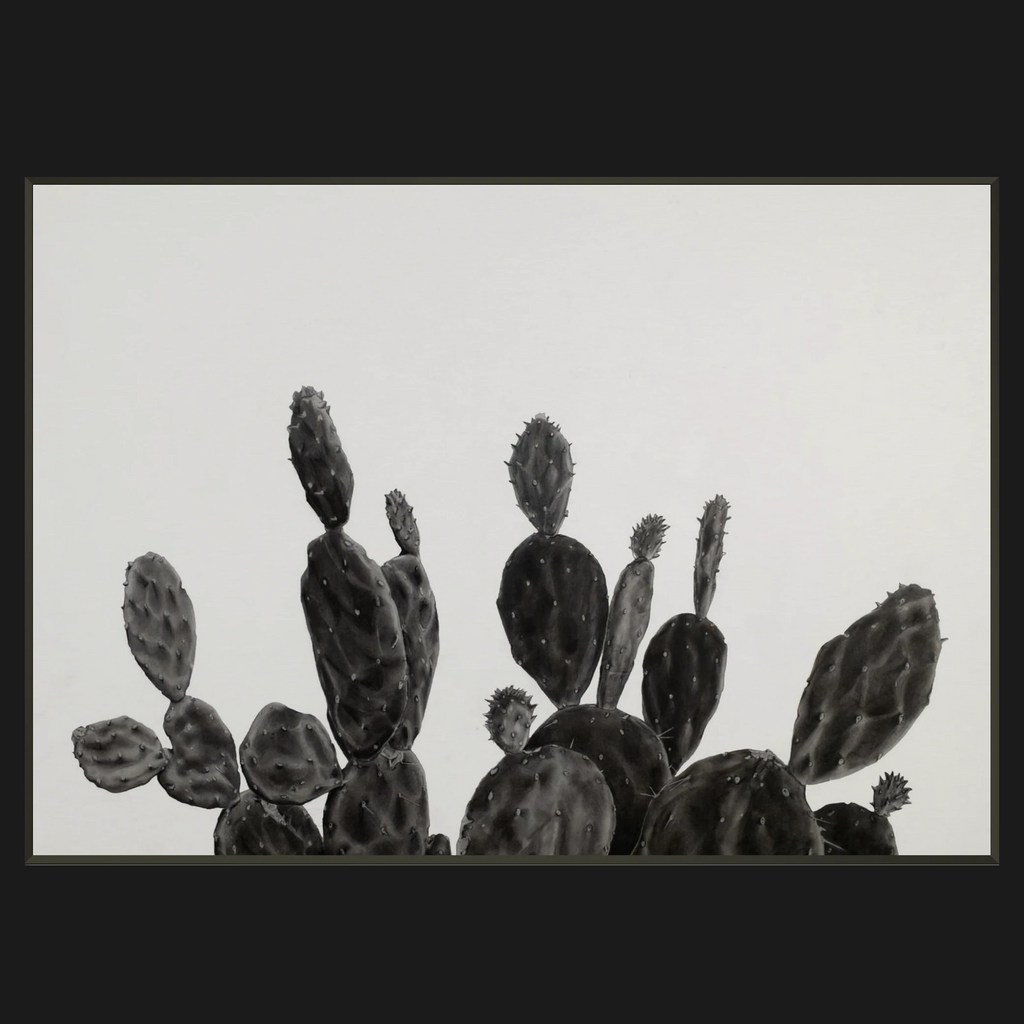 A black and white botanical art print depicting a prickly pear cactus against a light gray background, framed by a wide black border.