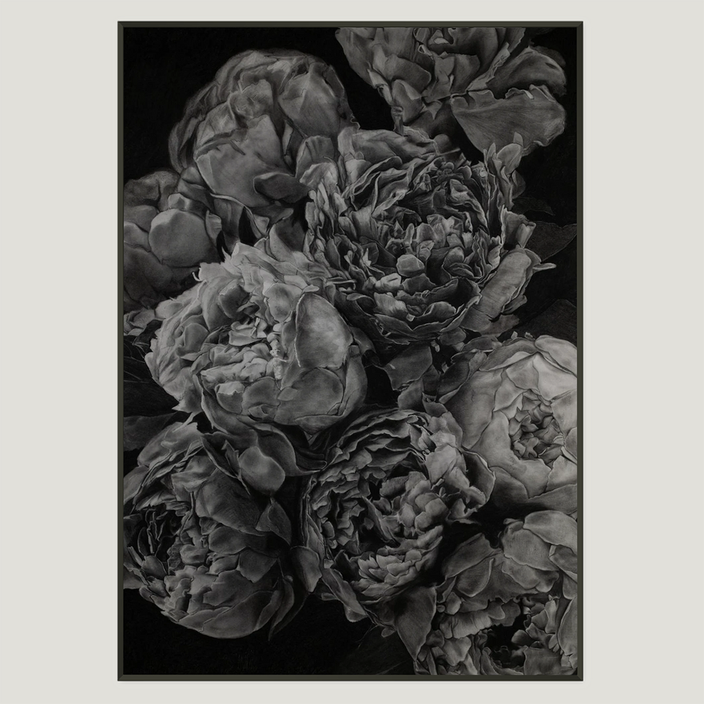 A black and white fine art print depicting a close-up of peony flowers, framed by a thin black border on a light gray background.